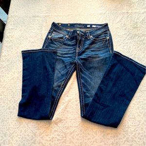 Miss Me jeans dark wash and flattering boot cut leg.